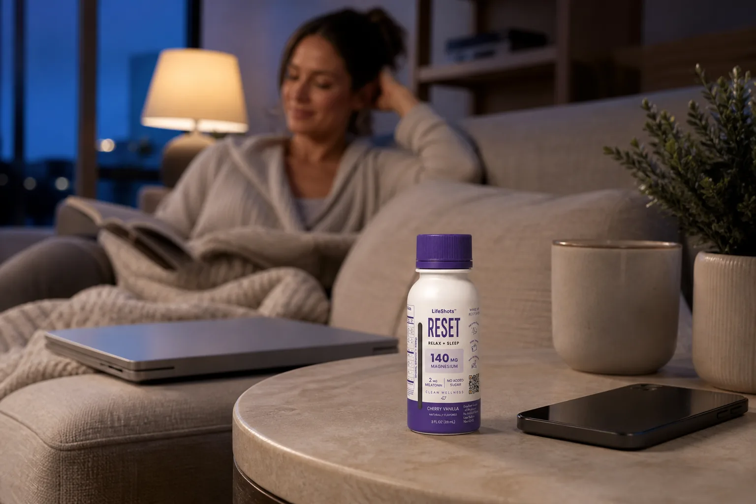 LifeShots RESET 3 oz sleep shot bottle in an everyday moment